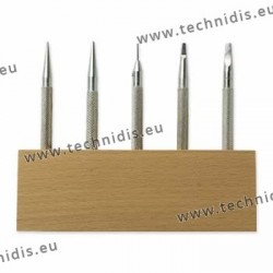 Set of punching tools on wood stand