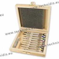 Set of screwdrivers and wrenches in wooden storage box
